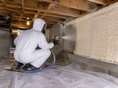 Crawl space foundation wall sealed with closed-cell foam